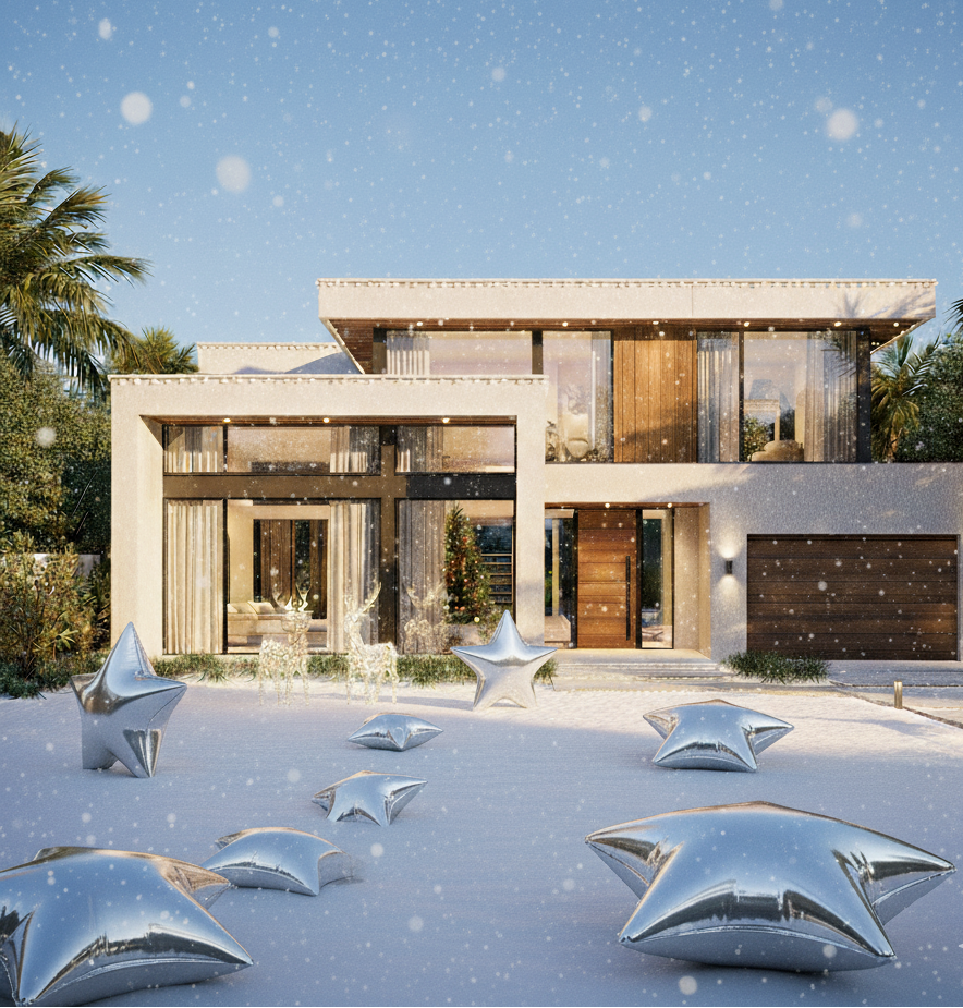 Modern house with decorative silver star sculptures in front on a snowy day.